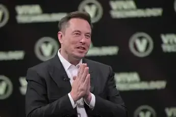Elon Musk wins an $878 billion compensation package from Tesla