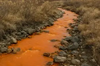 Climate change is turning Alaska's rivers orange.